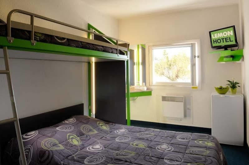 Lemon Hotel Le Coteau Bagian luar foto